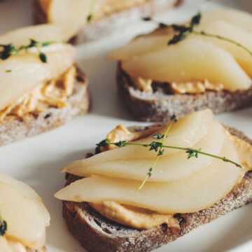 smoked cashew cheese toast with poached pear & fried thyme_hot for food