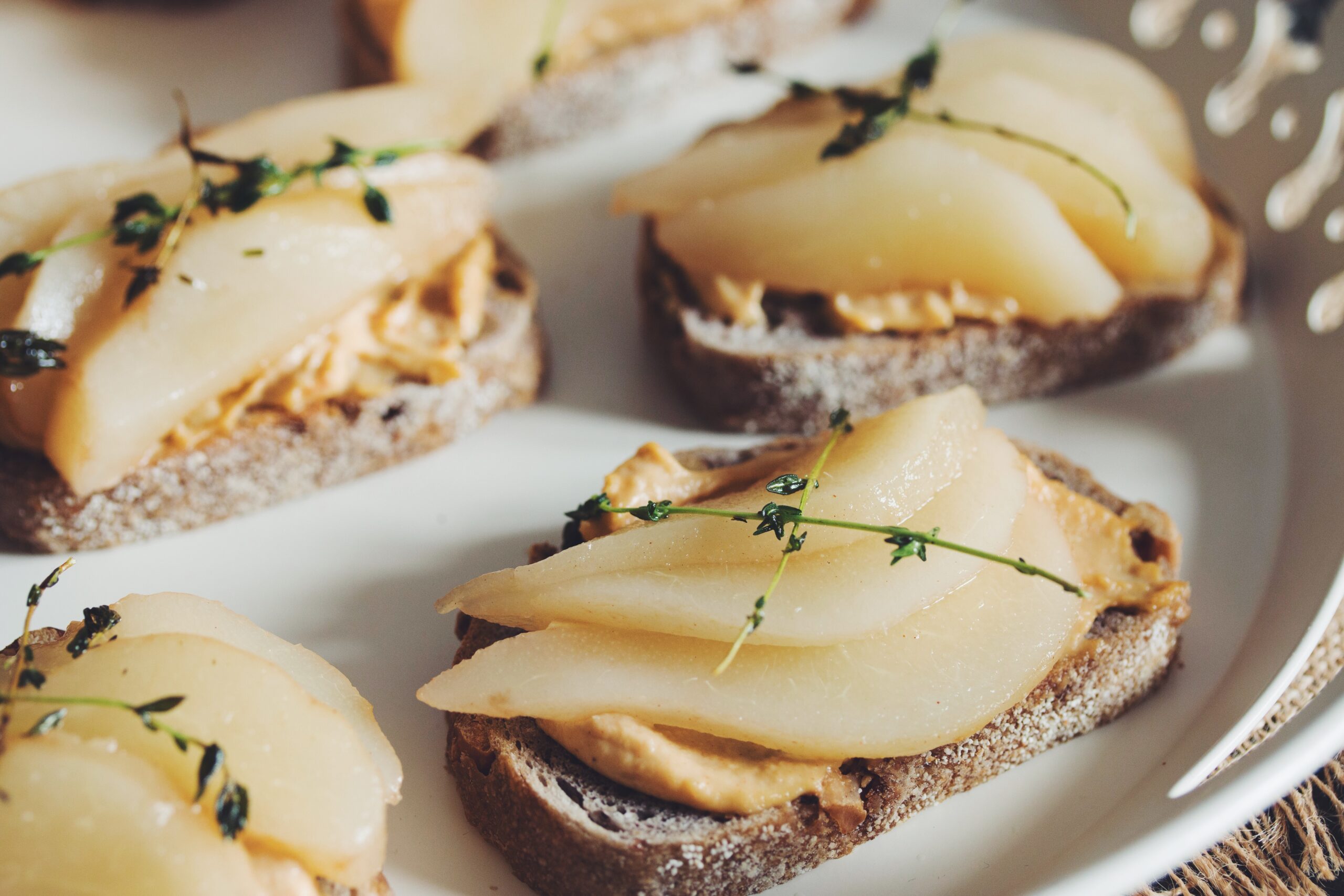 Smoked Cashew Cheese Toast With Poached Pear & Fried Thyme