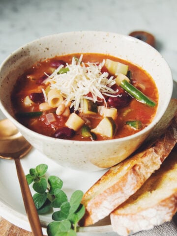 vegan minestrone soup with pasta and beans close-up