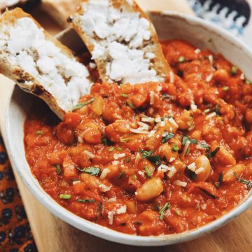 cheesy harissa stewed beans