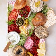 vegan bagel board with beet lox and whitefish spread